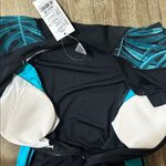 NWT women’s medium surf suit long sleeve Photo 2