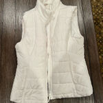 Aeropostale Stay warm and stylish with this sleek white puffer vest. Perfect for layering in cooler weather. Photo 0