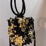 Elegant Black and Gold Sequin Handbag Photo 1
