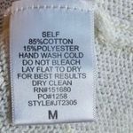 Storia  embroidered stars oversized flowy knit sweater Photo 5