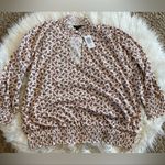 Torrid NWT  Textured Jersey Choker Neck Smocked Bottom‎ Top Photo 4