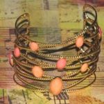 Gold and peach jewel stone metal bracelet‎ Photo 0