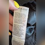 Athleta  Triumph Hybrid Half Zip Sweatshirt black size small Photo 5