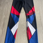 Under Armour  Women's Colorblock Leggings - Black, Red, Blue Photo 0