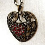 Brass tone red rhinestone heart pendant necklace Photo 1