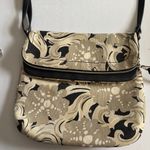 Relic BRAND CREAM AND BLACK CANVAS CROSSBODY SNAP CLOSURE WITH A ZIP CLOSURE TOO Photo 0