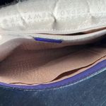 Kate Spade ♠️ purple purse. Used good condition. Some fraying on strap. Photo 2