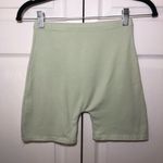 Brandy Melville John Galt Light Green Bike Shorts OS Photo 1