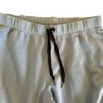 PINK - Victoria's Secret Pink VS Flare Pull On Sweatpants Sz L Blue Drawstring Raw Hem Pink Spell Out Photo 1