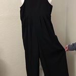 Boutique brand Size large black jumpsuit. Photo 0