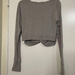 Free People FP MOVEMENT stone beige twist front long sleeve shirt size large Photo 4