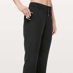 Lululemon  On The Fly Crop Woven Pants 23” in Black Size 6 Photo 3