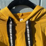 Alo Yoga Never worn Alo cropped hoodie in mustard; size S Photo 1