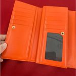 MCM  tri fold‎ wallet with bow, orange Photo 5