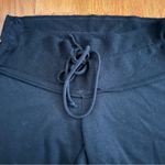 T Party Fashion T Party Black Flare Yoga Pants with Fringe Hem Size Small Photo 3