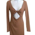 Forever 21 Twisted Cutout Bodycon Dress Taupe Size S NWT DETAILS A knit mini dress featuring a low scoop neck that ends in a twisted bust, front cutout, long sleeves, and a bodycon silhouette. Content + Care - 68% polyester, 29% rayon, 3% spandex - Hand wash cold Size + Fit - Measured from a size Small - Full length: 32" - Chest: 14.25" - Waist: 13" - Sleeve length: 23.5" Product Code: 2000426862 SKU: 2000426862032 Photo 5