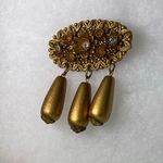 Vintage celluloid float dangle gold tone brooch Photo 2