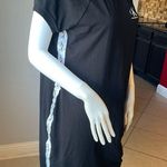 Calvin Klein  dress size Large 
In great condition 
Stretchy 
Logo on both sides Photo 1