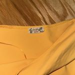 Free People  Yellow One Shoulder Puff Sleeve BodySuit Photo 1