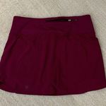 Athleta running skort cranberry color size medium Photo 2