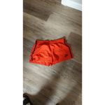 Nike  Womens Orange Athletic Shorts With Black Stripe Accents - Lightweight Photo 1