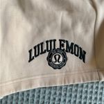 Lululemon NWT  Scuba Mid-Rise Oversized Short 7" Graphic
Medium
Butter cream Photo 1