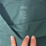 Girlfriend Collective  COMPRESSIVE HIGH-RISE
BIKE SHORTS, GREEN  SIZE: M Photo 8
