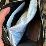 Coach Limited Edition🔥Authentic  pebbled leather zip top wristlet "Wonder woman" Photo 9