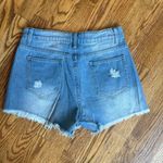 Denim button fly, distressed, cut off shorts Photo 1
