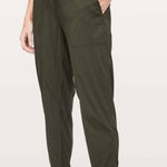 Lululemon Dance Studio Crop *25" in Dark Olive Stretch Cropped Pockets Athletic Photo 0