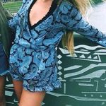 Stella Laguna Beach Long Sleeve Romper Photo 0