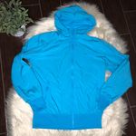 Nike The athletic depart. turquoise hooded windbreaker Photo 0