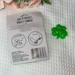 New St. Patrick's Day Light up bracelet 1 Light Up button Green Photo 1