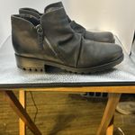 Clark size 9 ankle fashion boot. And good used condition. The bottoms look new. Photo 1
