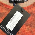 Pretty Little Thing  Plus - Contrast Stitch Mesh Underbust Top in Orange Photo 1