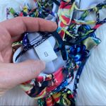 Abstract Plunging Strappy Cheeky Colorful Cutout Bathing Suit Photo 10