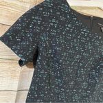 Maggy London floral lace fitted asymmetrical neckline black/ green dress Size 10 Photo 4