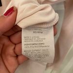 Under Armour  Women’s Light Tan long sleeve top Photo 8