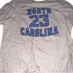 Nike Jordan Men's or Women’s White and Blue North Carolina Jersey Photo 1