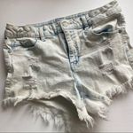 Altar'd State Altar’d State • Light Blue Destroyed Wash Raw Hem Jean Shorts Photo 0