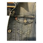 Levi's  Classic Trucker Denim‎ Jean Jacket
- Women's S-P- Medium Wash
Buttoned Photo 4