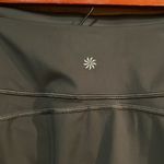 Athleta Ace Black Tennis Skort with silver reflective stripe on waistband Photo 5