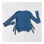 Free People β
FP One Interlaken Long Sleeve Side Tie Blue Thermal Top β
Photo 6