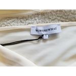 We Wore What  Women's Asymmetrical Thong Bodysuit Ivory Size L Photo 3