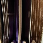 Coach  signature Charlie C zip around wallet gold with purple interior Photo 13