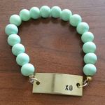 *5/$25 sale* XO goldtone plate & mint beaded stretchy bracelet Green Photo 0