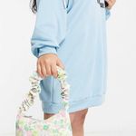 ASOS DESIGN ditsy pastel pink green floral print shoulder bag with ruched strap Photo 3