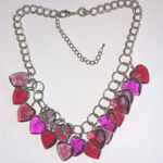 Silver Tone Heart Charm Statement Necklace with Red and Pink Accents Photo 0