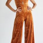 Francesca's Estella Velvet Star Jumpsuit  Photo 0