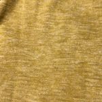 Listicle women’s long sleeve button back top in VGUC. Photo 1